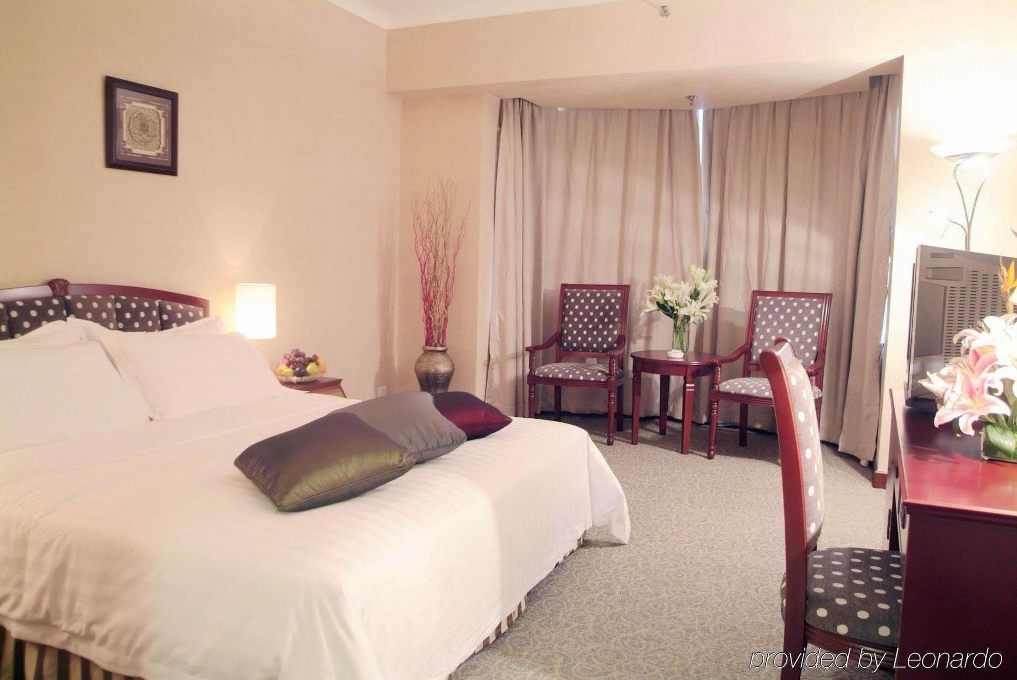 Rosedale Hotel&Suites Cantón Habitación foto